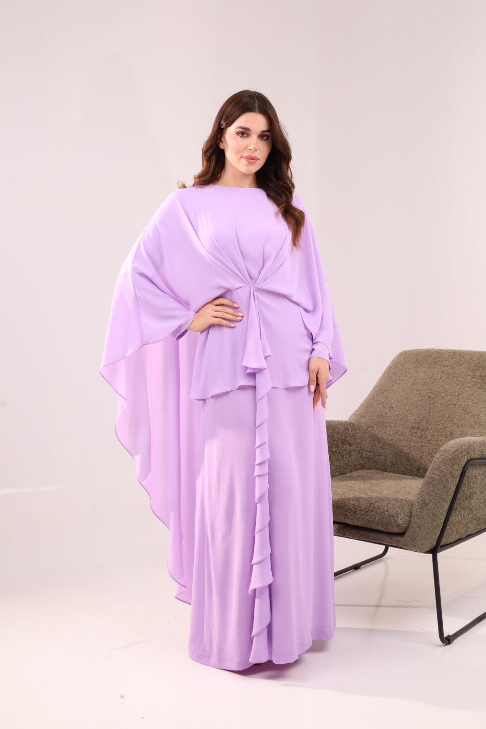 Lilac maxi dress, elegant evening dress, modest formal dress, cape sleeve gown, chiffon maxi dress, luxury occasion wear, pastel purple dress, wedding guest dress, flowing evening gown, sophisticated women’s fashion.
