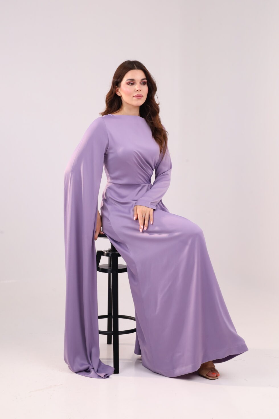 Lilac maxi dress, elegant evening gown, drape sleeve dress, modest formal dress, flowing sleeve maxi dress, luxury occasion wear, pastel purple gown, sophisticated women’s fashion, wedding guest outfit, timeless elegant dress.