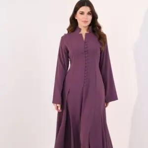 Plum purple maxi dress, elegant modest dress, button detail gown, long sleeve evening dress, formal occasion wear, luxury modest fashion, flowing purple gown, sophisticated women’s fashion, timeless elegant dress, wedding guest outfit.